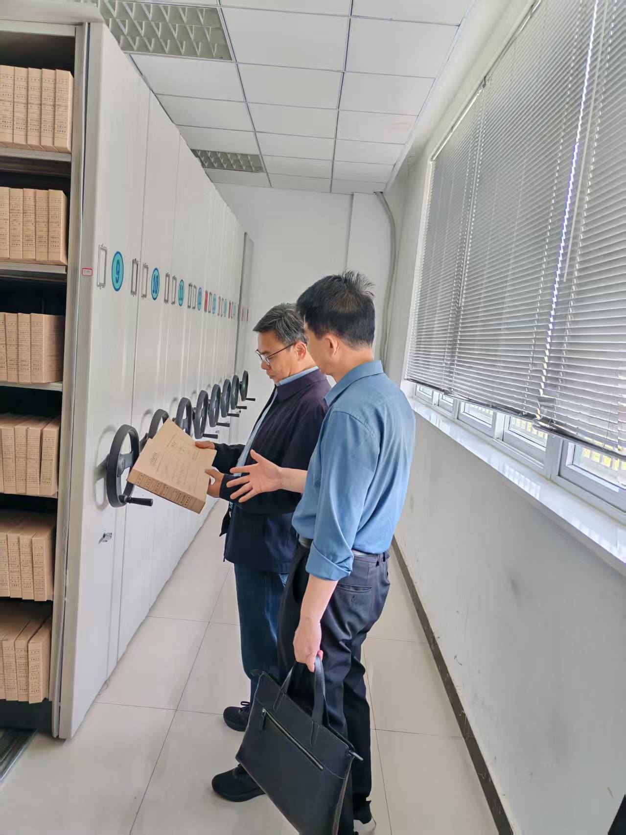 精准助企显担当 档案赋能促发展 ---市档